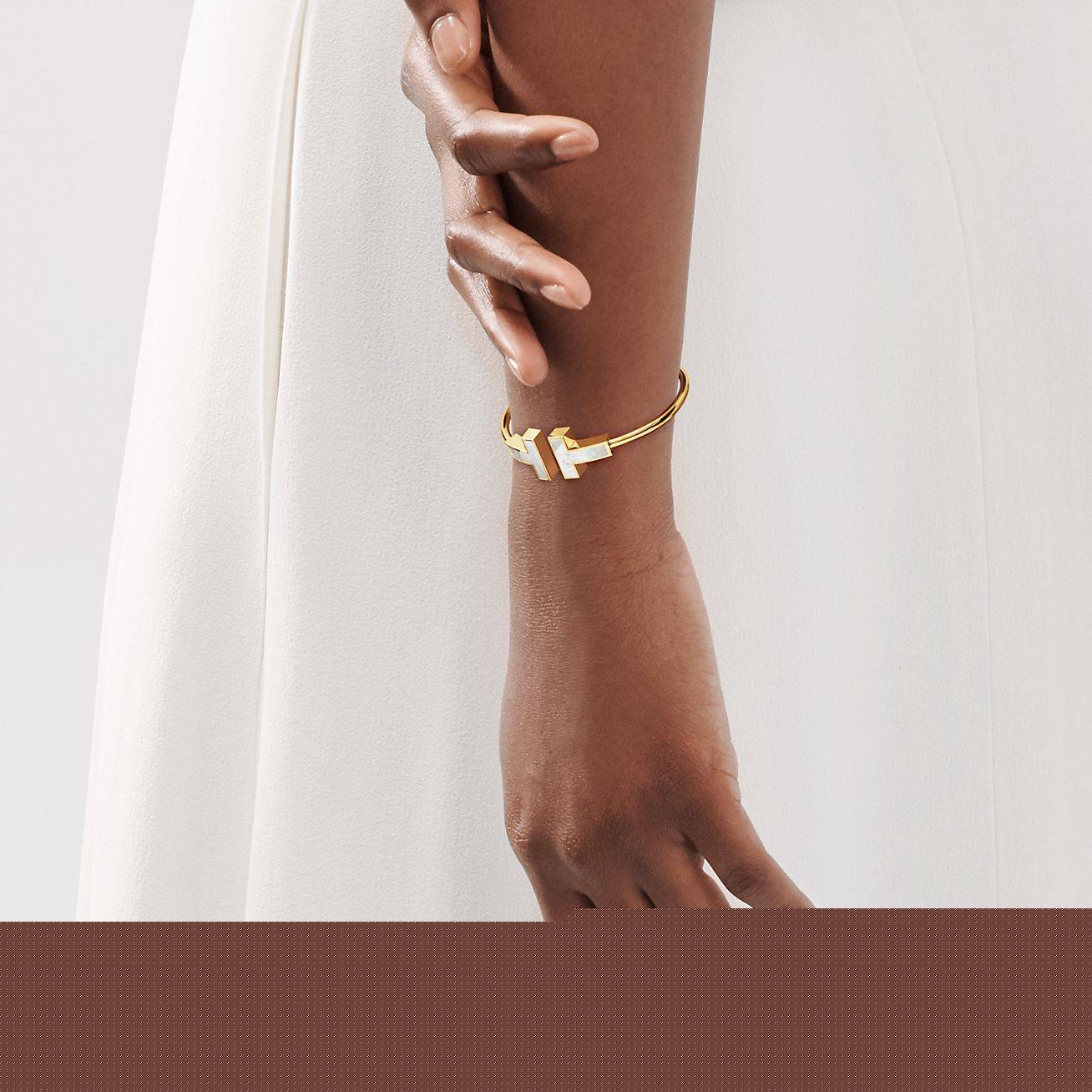 T*f*ny t wide mother-of-pearl wire bracelet in 18k gold